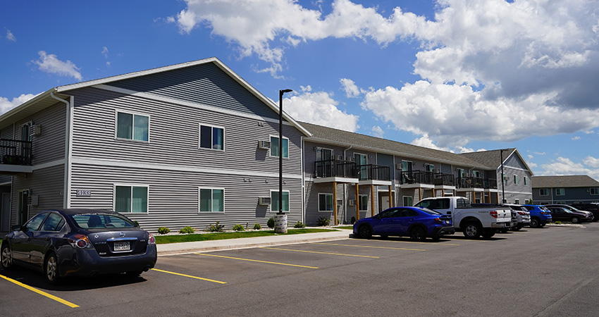 Photograph of a row of suburban houses and apartments
